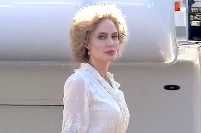 ** RIGHTS: NO WEB ** Hollywood, CA  - *PREMIUM-EXCLUSIVE* **STRICT WEB EMBARGO UNTIL 8:00 AM PT on September 26, 2018**Actress Angelina Jolie is seen in full costume and wig as Rose on the set of her latest film 'Come Away' at a studio lot in Hollywood. Angelina's co-stars on the project, David Oyelowo and Jordan A. Nash, who plays Peter Pan, were also seen arriving on set. The fantasy film, directed by  Brenda Chapma, is a  prequel to the stories of Peter Pan and Alice in Wonderland. *Shot on September 24, 2018*

Pictured: Angelina Jolie

BACKGRID USA 25 SEPTEMBER 2018 

BYLINE MUST READ: W Blanco / BACKGRID

USA: +1 310 798 9111 / usasales@backgrid.com

UK: +44 208 344 2007 / uksales@backgrid.com

*UK Clients - Pictures Containing Children
Please Pixelate Face Prior To Publication*