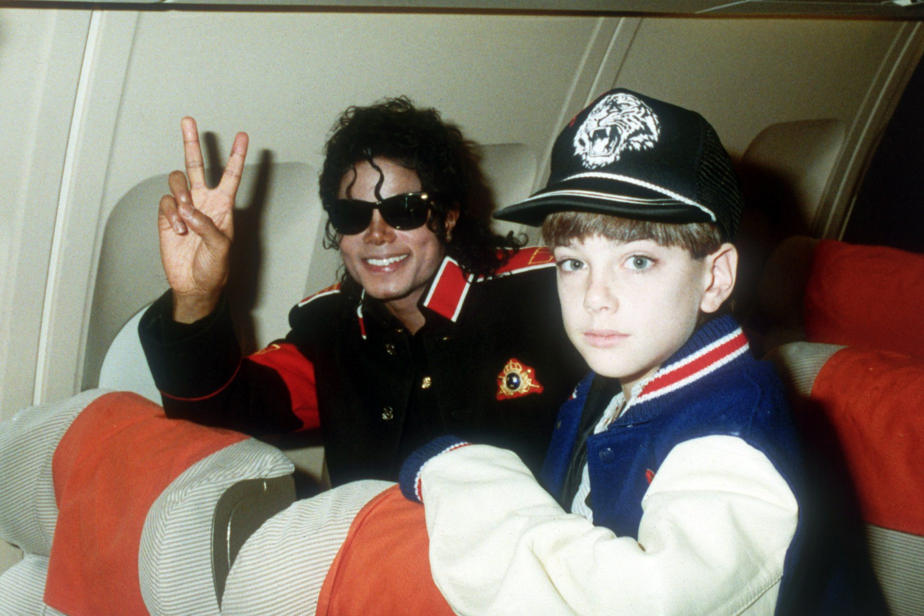 UNSPECIFIED - JULY 11: Michael Jackson with 10 year old Jimmy Suchcraft on the tour plane on 11th of July 1988.(Photo by Dave Hogan/Getty Images)