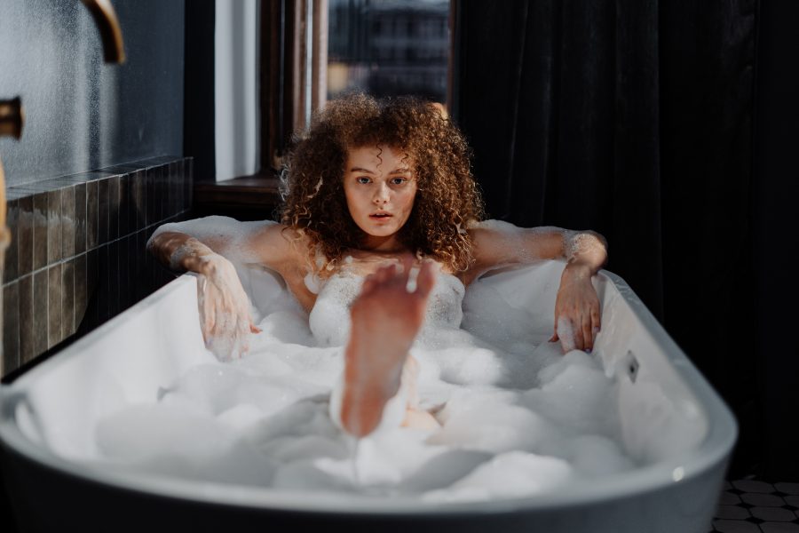 woman-in-bathtub-with-water-4155496